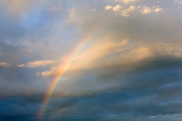 stock image Rainbow in the cloudy sky