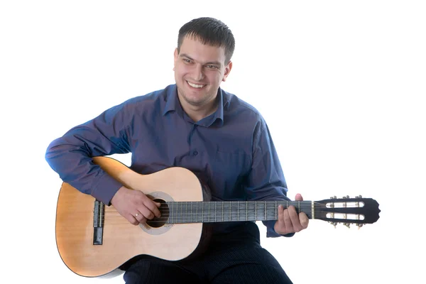 The man plays a classical guitar — Stock Photo, Image