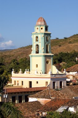 Belltower in the old town Trinidad, Cuba clipart