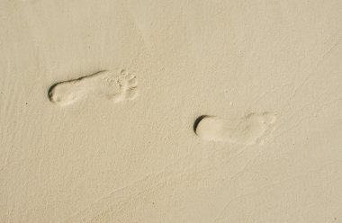 Human traces on sand clipart