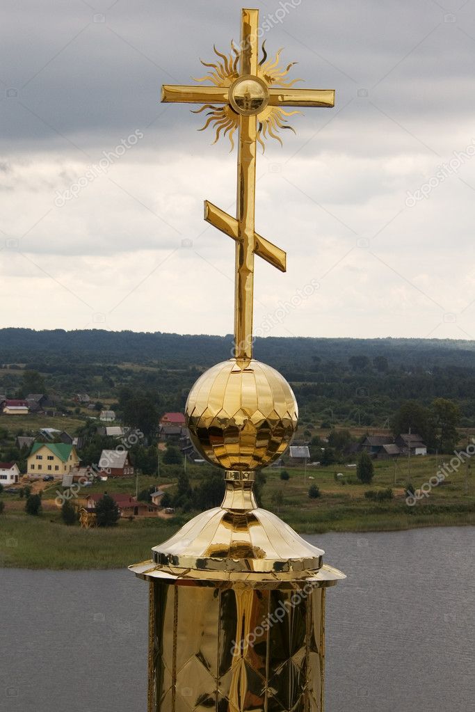 Gold cross with belltower