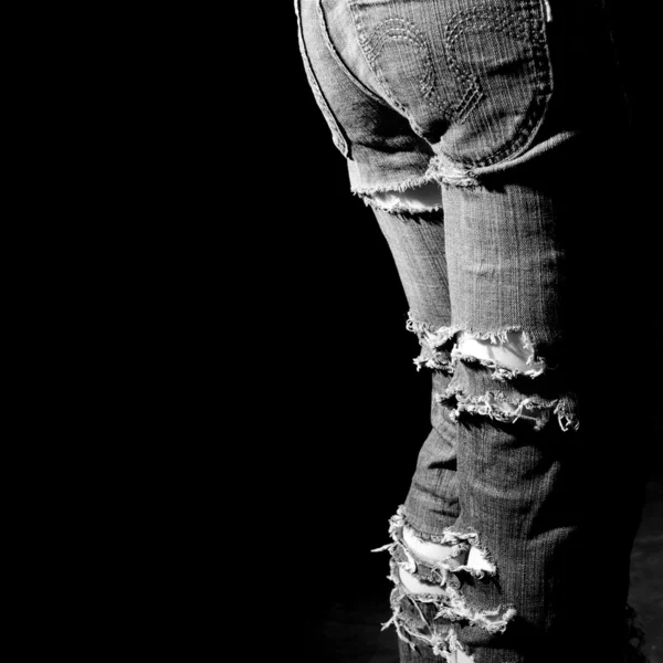 Zerlumpte Jeans Stockbild