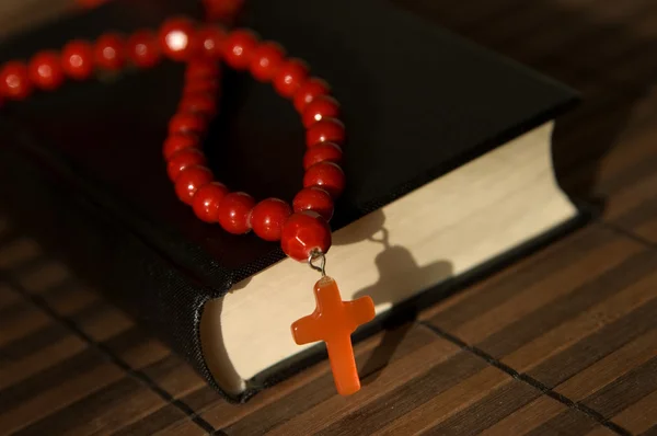 Stock image Bible with red cross