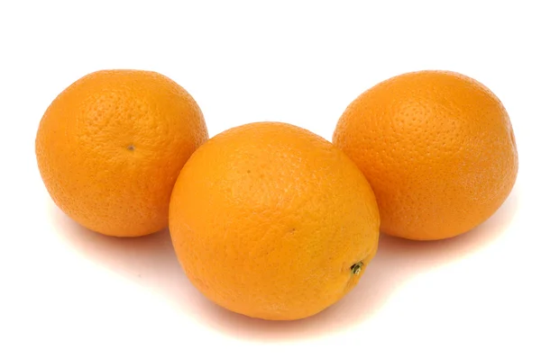 Tři pomeranče nad bílá — Stock fotografie