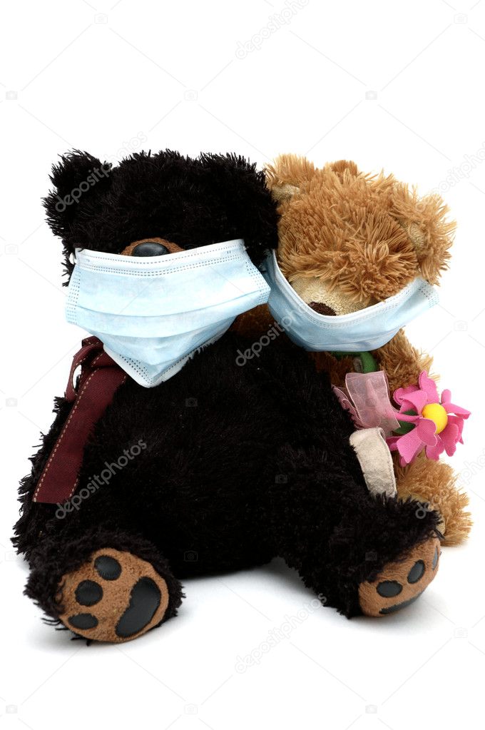 Teddy bears sitting in masks