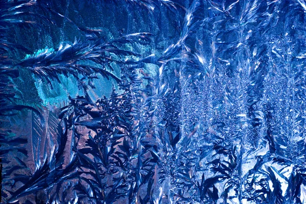 Frosty patroon op glas — Stockfoto