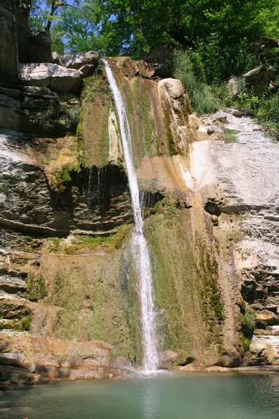 stock image Drop down small waterfall in mountain go