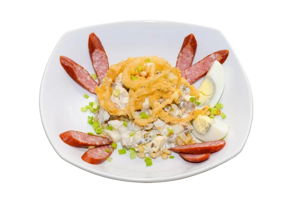 Salad with sausages eggs and mushrooms Royalty Free Stock Images