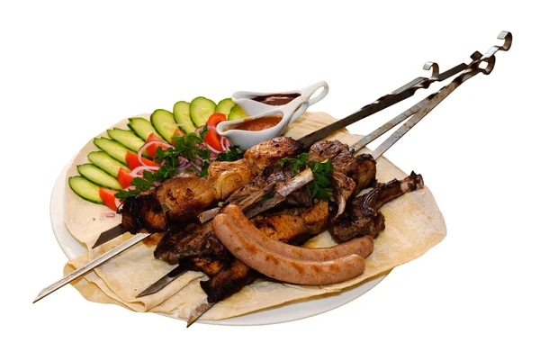 Grilled meat with vegetables Stock Image