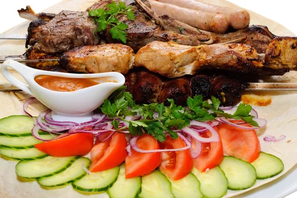 Grilled meat with vegetables Royalty Free Stock Images