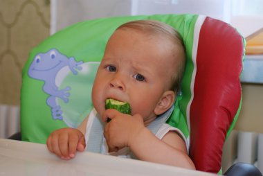 Baby with cucumber clipart