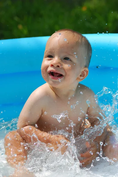Baby with splashes — Stock Photo, Image