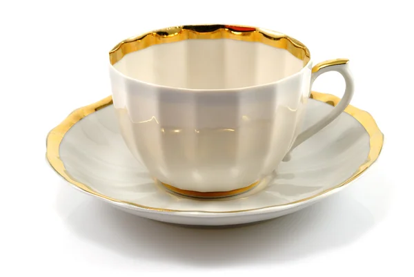 stock image Cup and saucer with gold trim