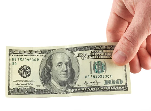 A 100 dolláros bankjegy a fehér kéz — Stock Fotó