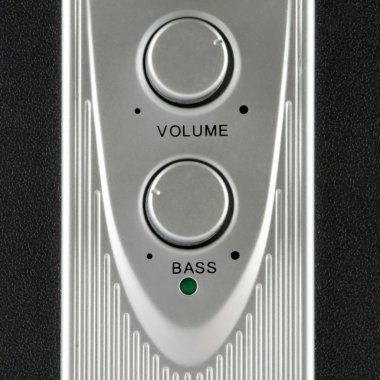 Volume and bass speaker controls closeup clipart