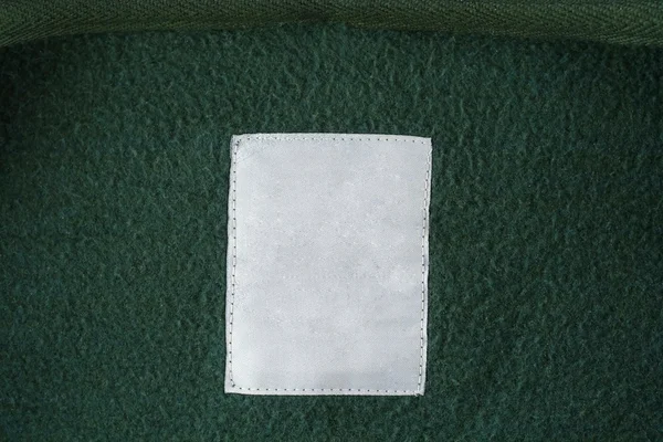 Bawełna kołnierzu płaszcza z pustą etykietę — Zdjęcie stockowe