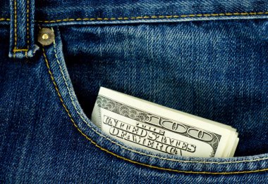 Blue jeans pocket with $100 banknotes clipart