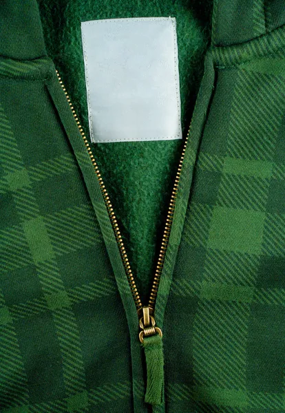 Col manteau en coton avec étiquette vierge — Photo