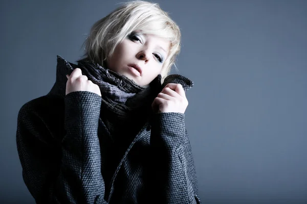 Fashion blond model with a coat — Stock Photo, Image