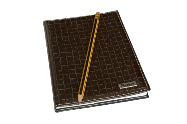 Ноутбук и карандаш — стоковое фото