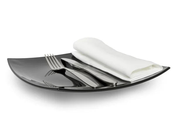Zwarte plaat mes vork en Servet — Stockfoto