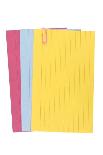 Gekleurde pagina's met een paperclip — Stockfoto