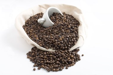 Coffee beans in a bag with a mug clipart