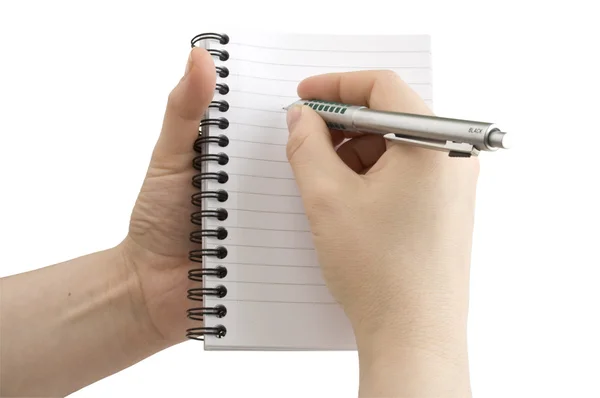 Caderno e caneta na mão — Fotografia de Stock