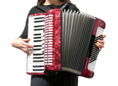 Cutout with a woman playing accordion on clipart