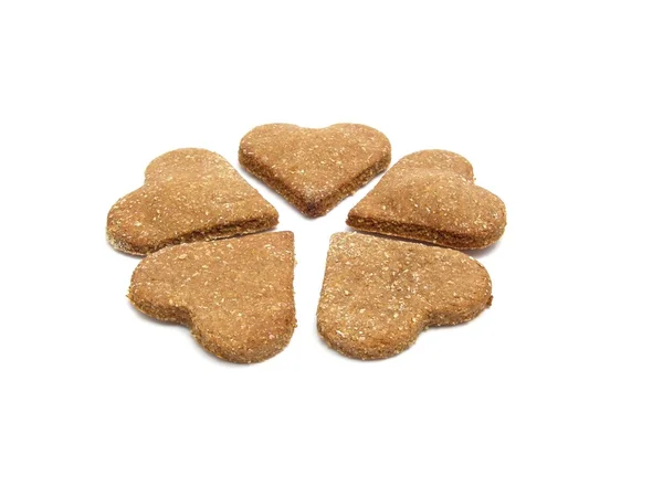 Selfmade wholemeal-hearts for dogs — Stock Photo, Image