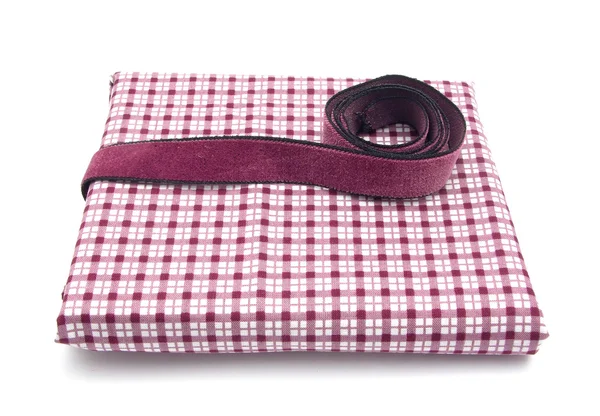 Purple band on a checked cloth — Stock Photo, Image