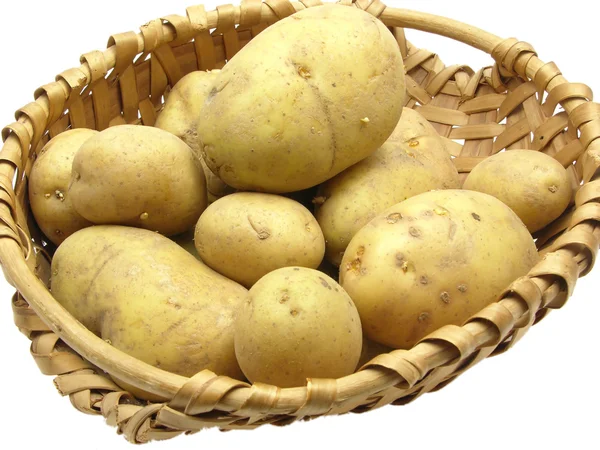 A basket with potatoes on a white backgr — Stock Photo, Image