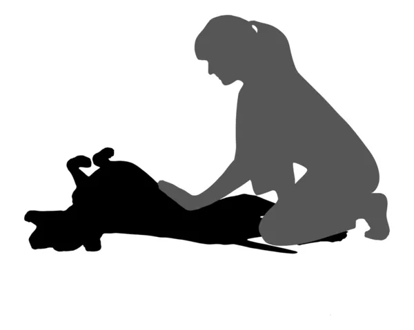 Woman caresses a dog — Stock Photo, Image