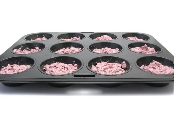 Hindbær muffins i en muffin kage pan b - Stock-foto