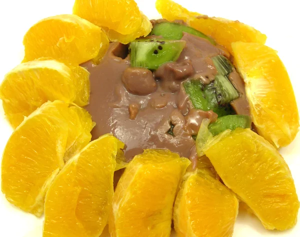 Chocolate pudding with kiwi fruit and or — Stock Photo, Image