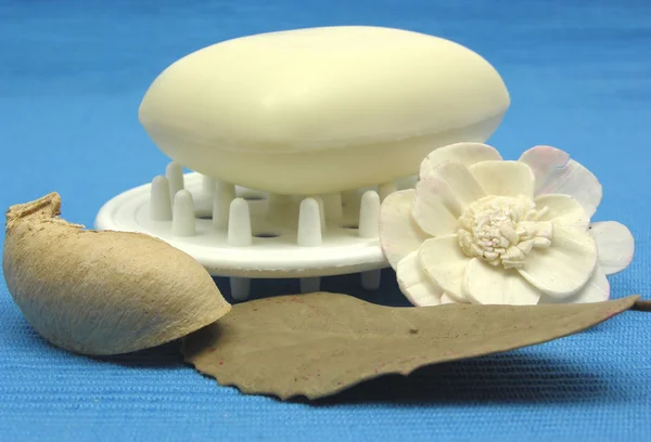 Beige soap with decoration articles on a — Stock Photo, Image