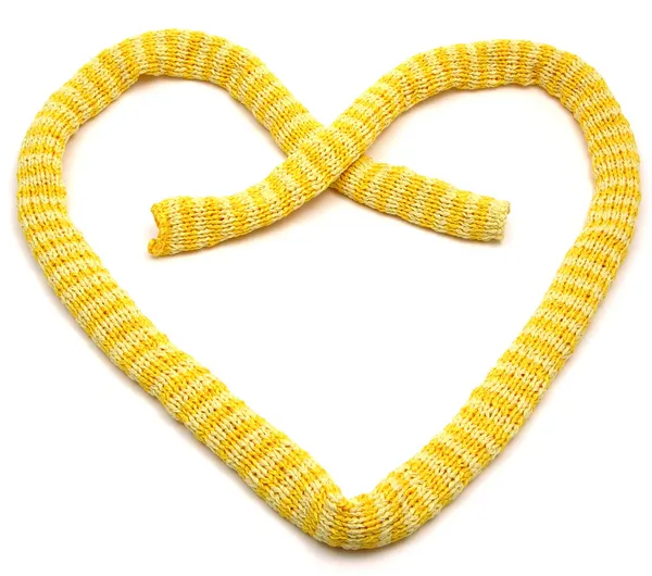 Yellow striped knitting scarf arranged a — Stock Photo, Image