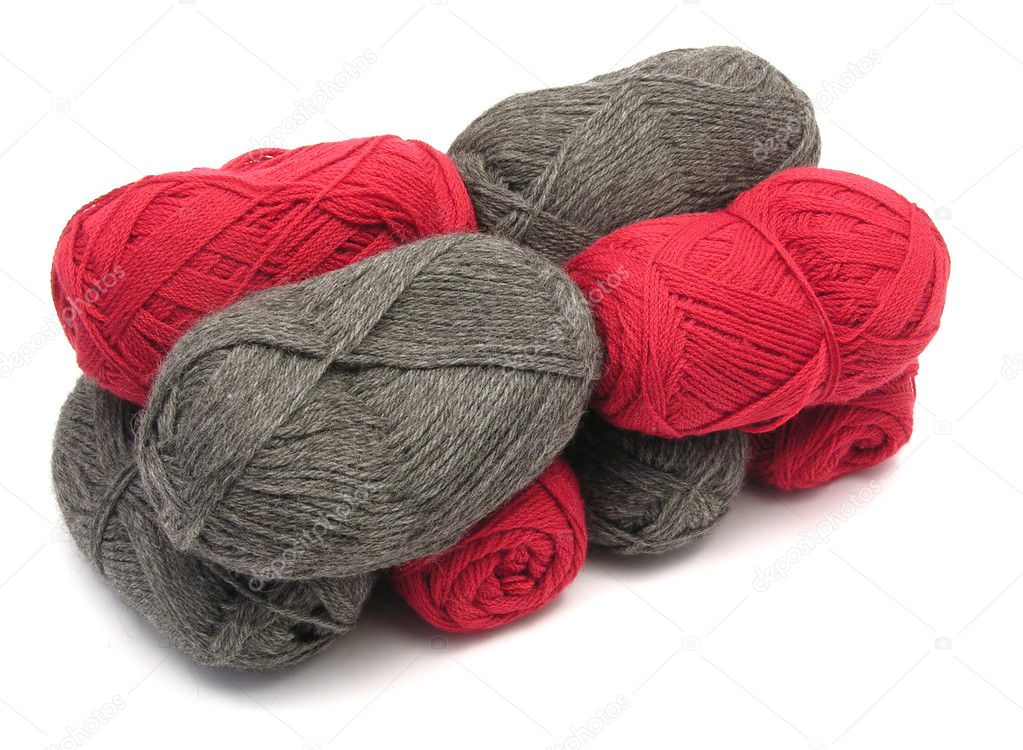 Gray and red new wool lying upon another