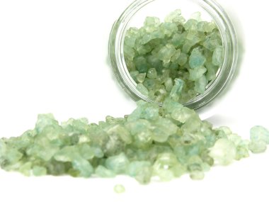 Green granulate for bathing out of a gla clipart