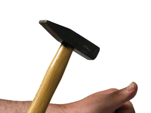 Homme frappe avec un marteau sur son pouce — Photo