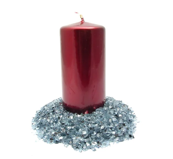 Red candle on blue glitter — Stock Photo, Image