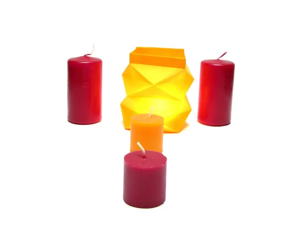 Égő gyertya színes papír dobozban egy — Stock Fotó