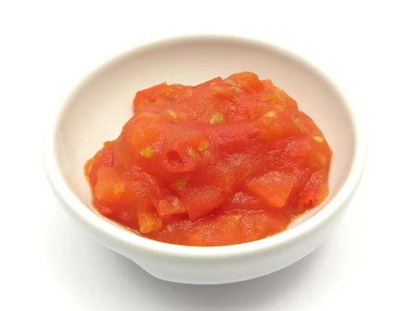 Mergulho de tomate em uma pequena tigela de chinawar — Fotografia de Stock