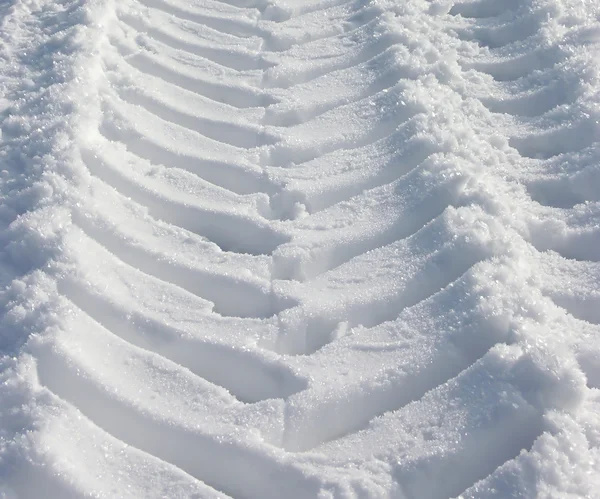 stock image The skidmark of a tractor in the snow