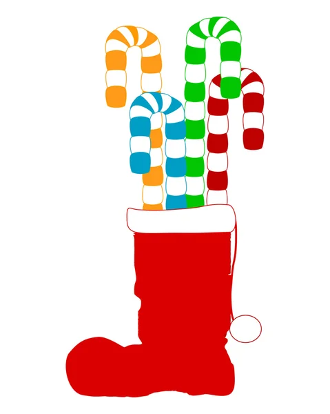 Uma grande bota de Papai Noel com alcaçuz — Fotografia de Stock