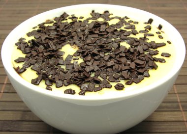 Custard with grated chocolate clipart