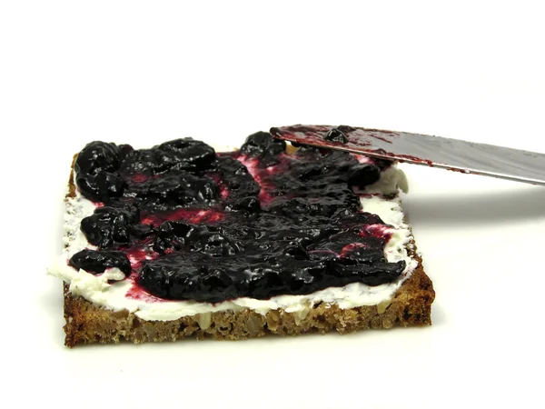 stock image Butterbread with bilberry jam