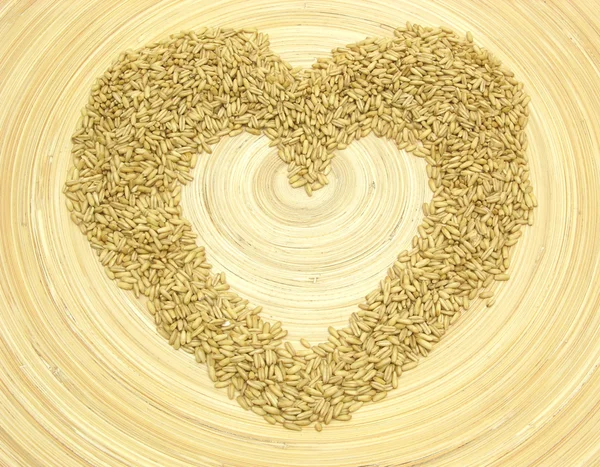Μπαμπού πλάκα με καρδιά από σιτάρι — Φωτογραφία Αρχείου
