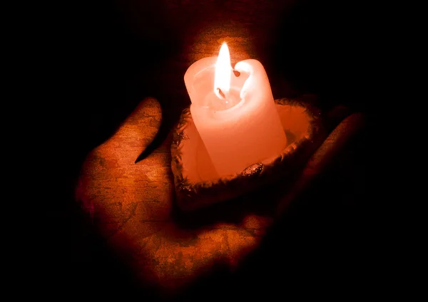 Svíčka na ruce — Stock fotografie