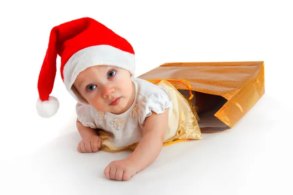Niño en sombrero de Navidad Imágenes de stock libres de derechos
